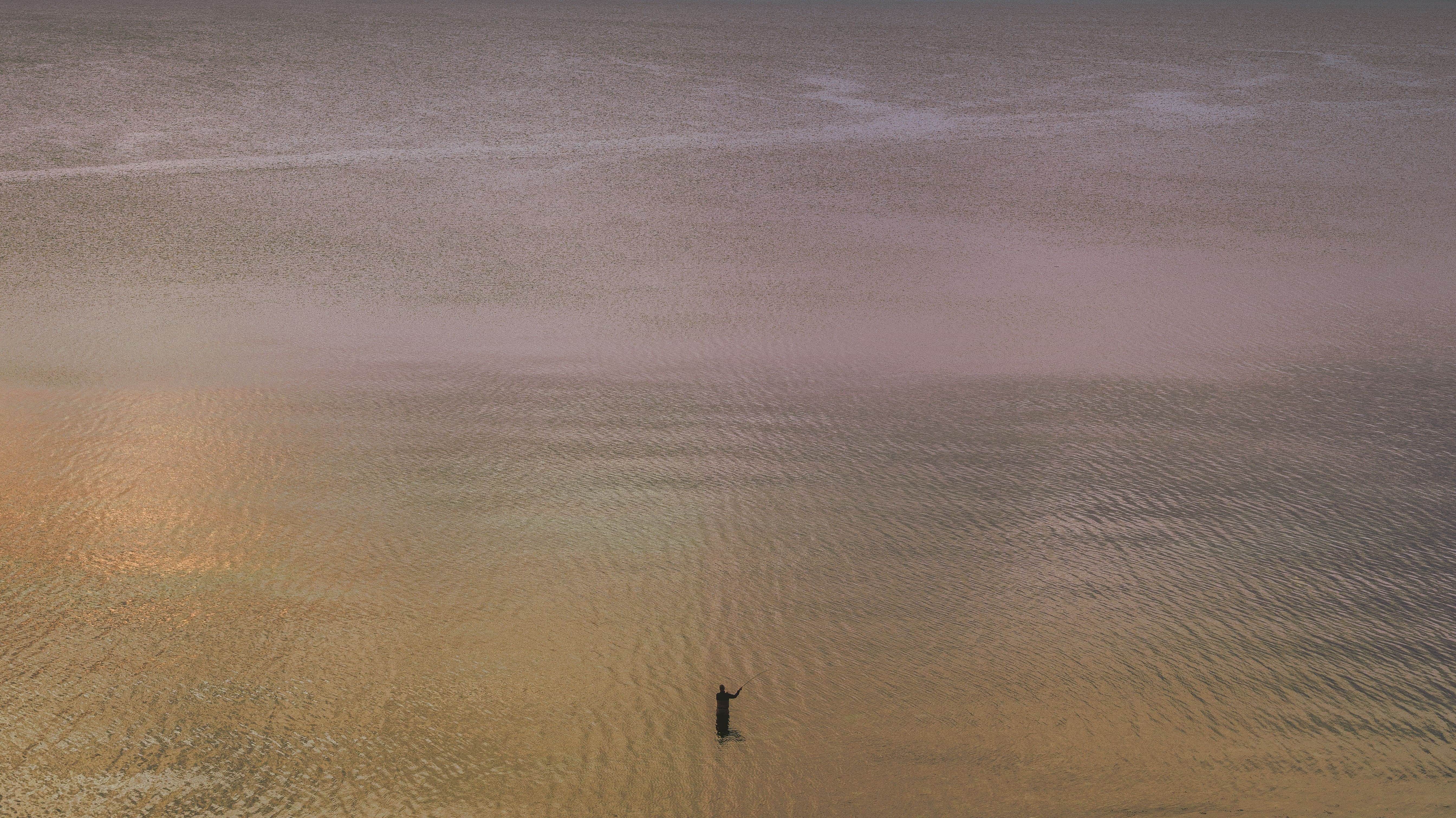 A lone fisherman during the 2019 COVID pandemic